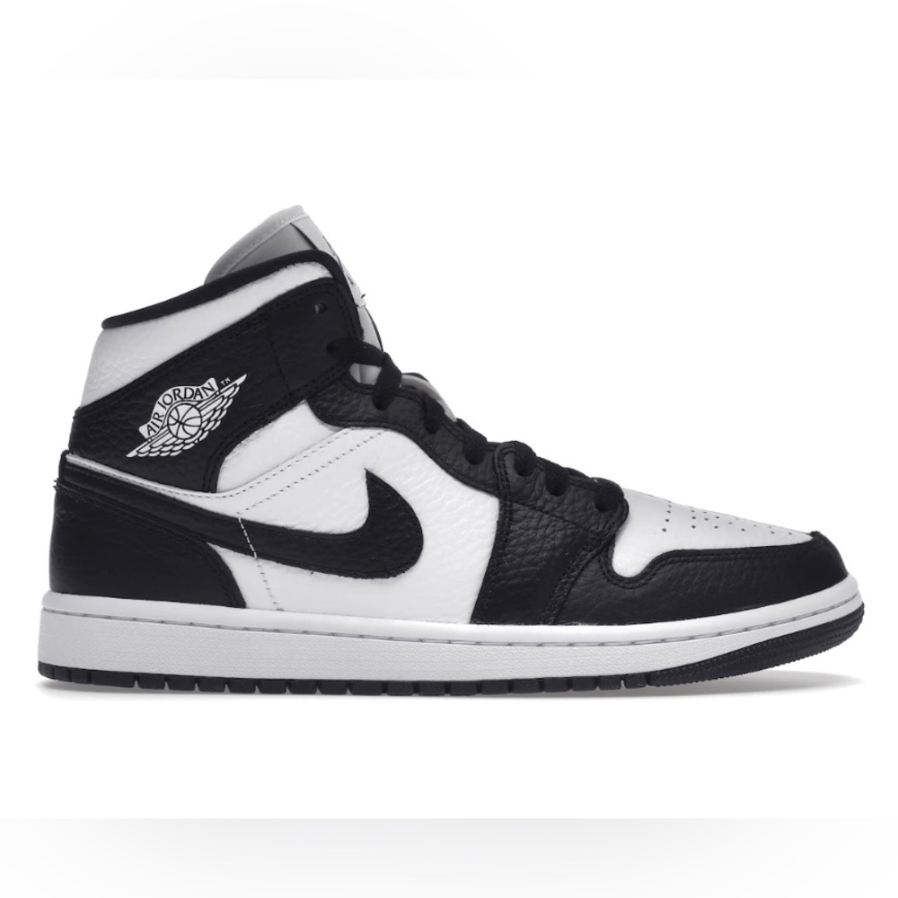 Black and white jordan 1s